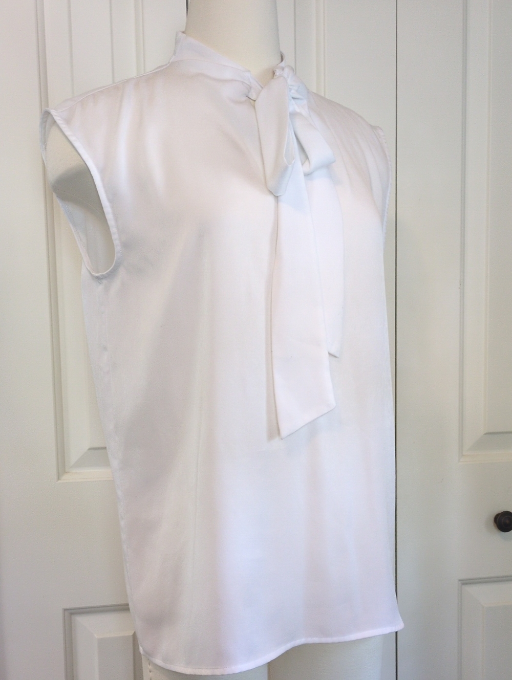 Silky White Sleeveless Tie-Neck Blouse